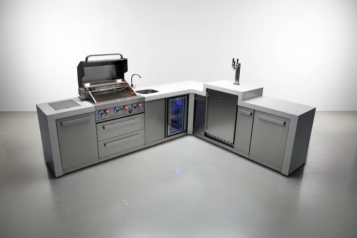 Modern outdoor kitchen with grill, refrigerator, and sink on a white background