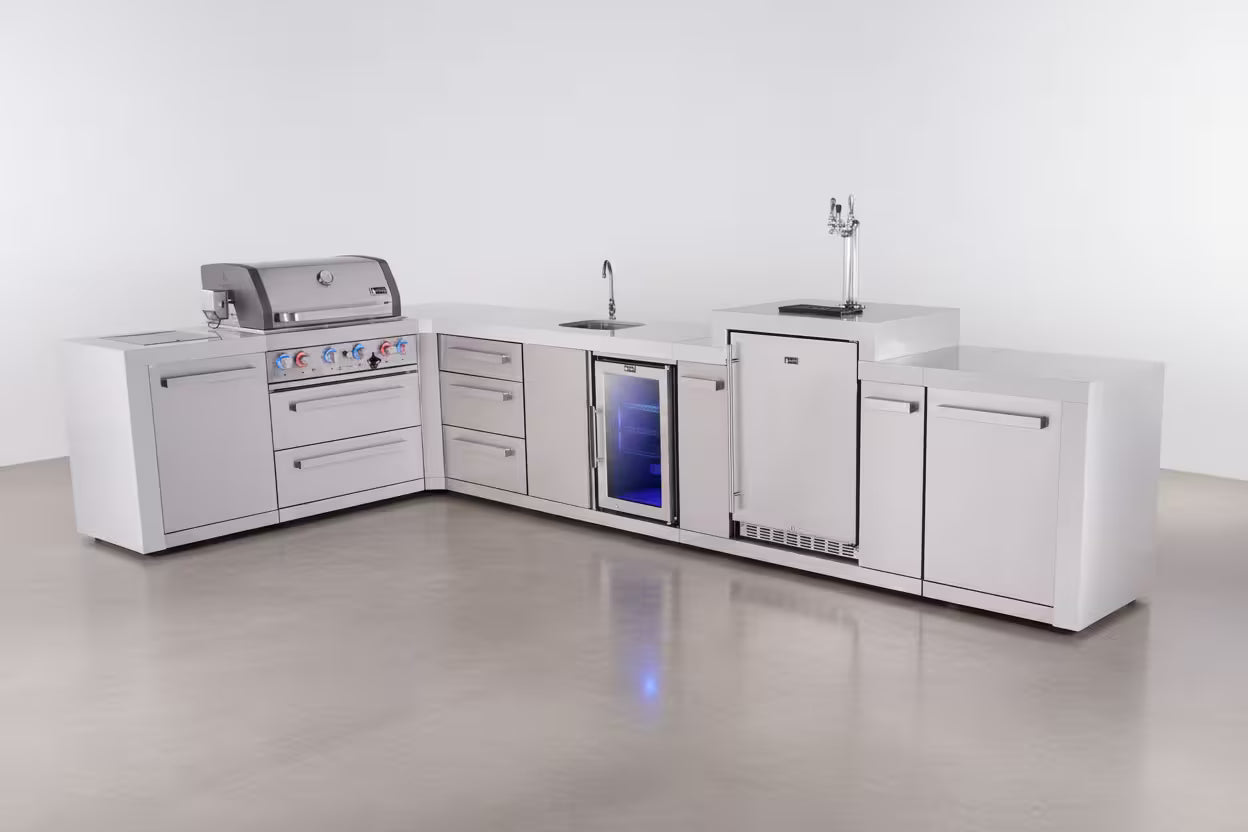 Outdoor kitchen with grill, sink, and refrigerator on a white background