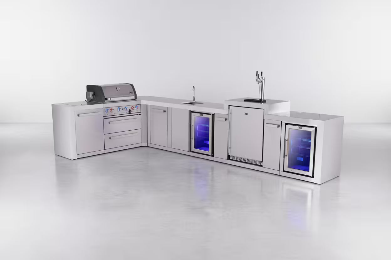 Modern outdoor kitchen with grill, sink, and refrigerator on a white background