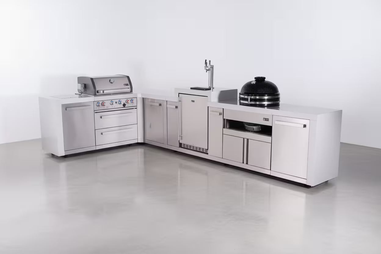 Outdoor kitchen with stainless steel appliances on a white background