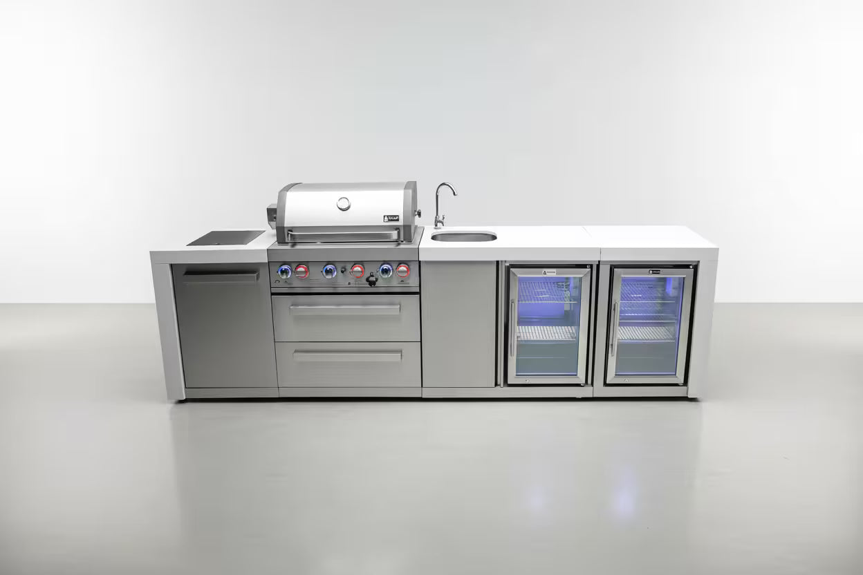 Outdoor kitchen island with grill, sink, and refrigerator on a white background